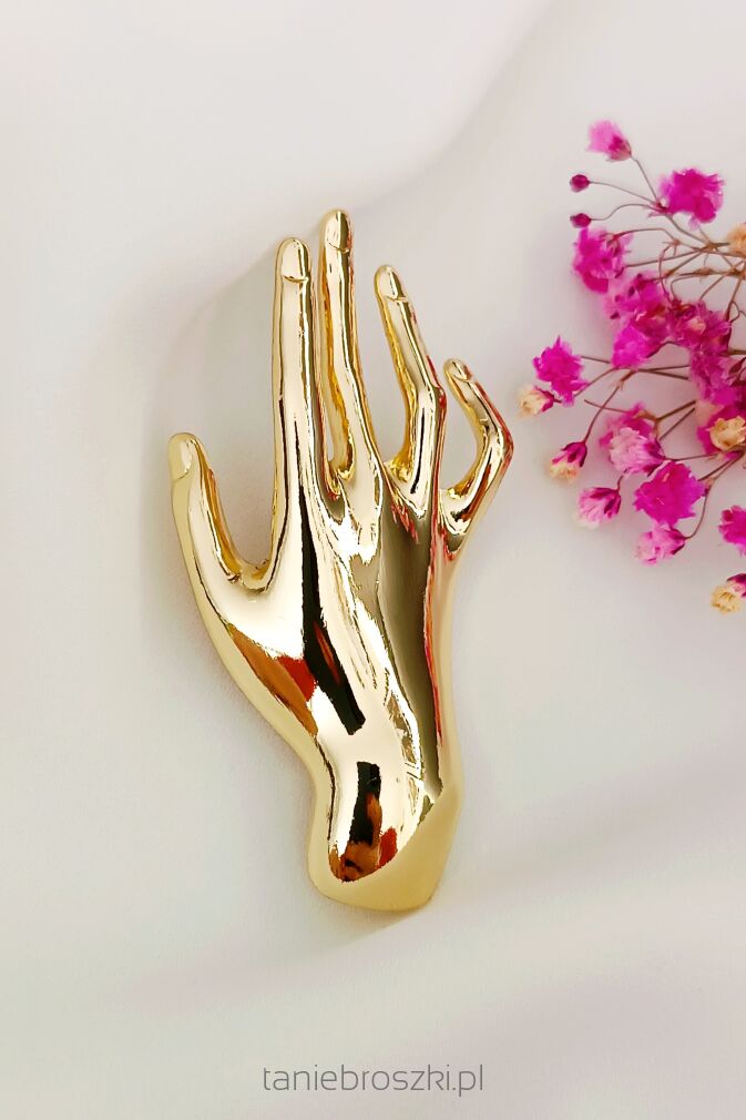 Minimalistyczna broszka dłoń