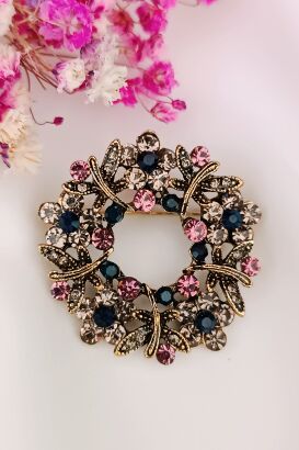 Mała broszka w kształcie wianka