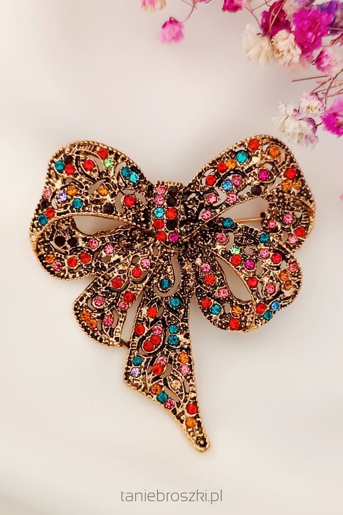 Kokarda z kolorowymi cyrkoniami