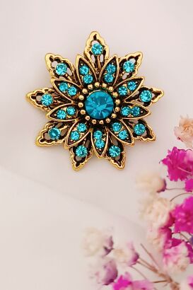 Niebieska broszka w kształcie gwiazdki